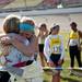 St. Joseph sophomore Jessie Armstrong embraces someone after competing in the MHSAA Division Two race on Saturday. She finished 54th. Daniel Brenner I AnnArbor.com